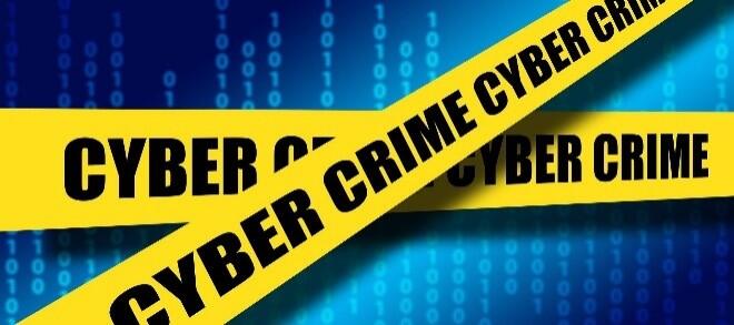 Two crossing ribbons that say Cyber Crime